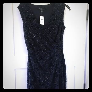Never worn. Navy party dress. Can send more photos